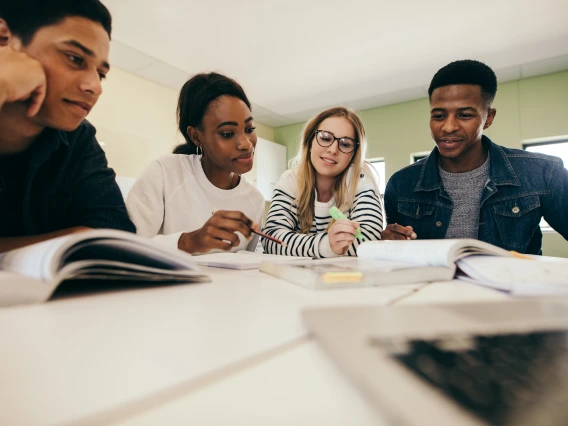 group of students sitting around a table