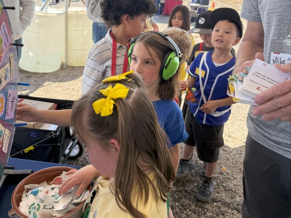 Students participating in the climate and health spin-the-wheel trivia game (2).