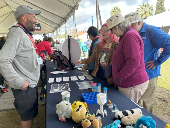 Dr. Jonathan Sexton and participants exploring ESRAC's germ table.