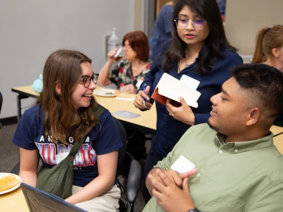 Photos of Science Café attendees Lea Pacou, Royani Saha, and Imran Mithu