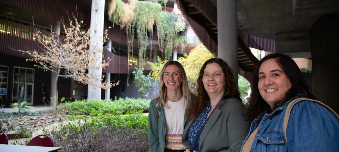 three women standing in front of the canyon at the ENRB 
