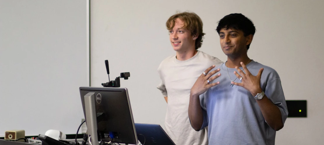 Photo of Owen Brosanders and Ojas Sanghi sharing their presentation.