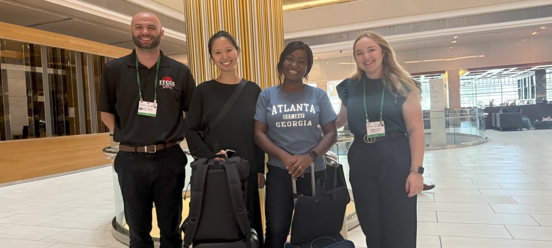 Snapshot of James Hollister, Audrey Yang, Tina Fingesi-Johnson, and Reagan Conner with thier luggage at the 2025 ISES/ISEE conference venue.