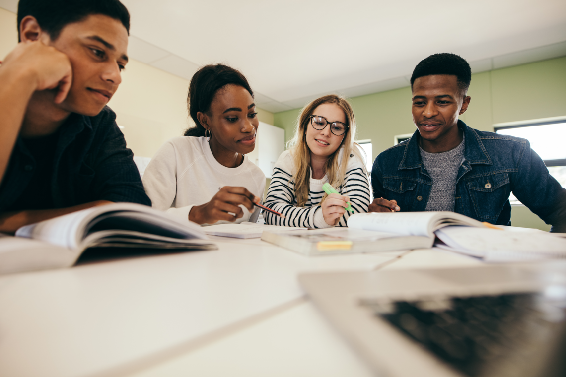 group of students sitting around a table