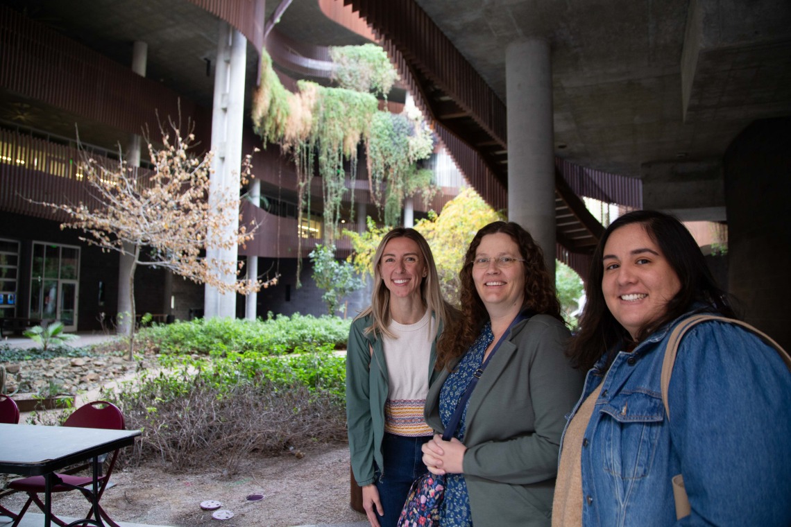 three women standing in front of the canyon at the ENRB 