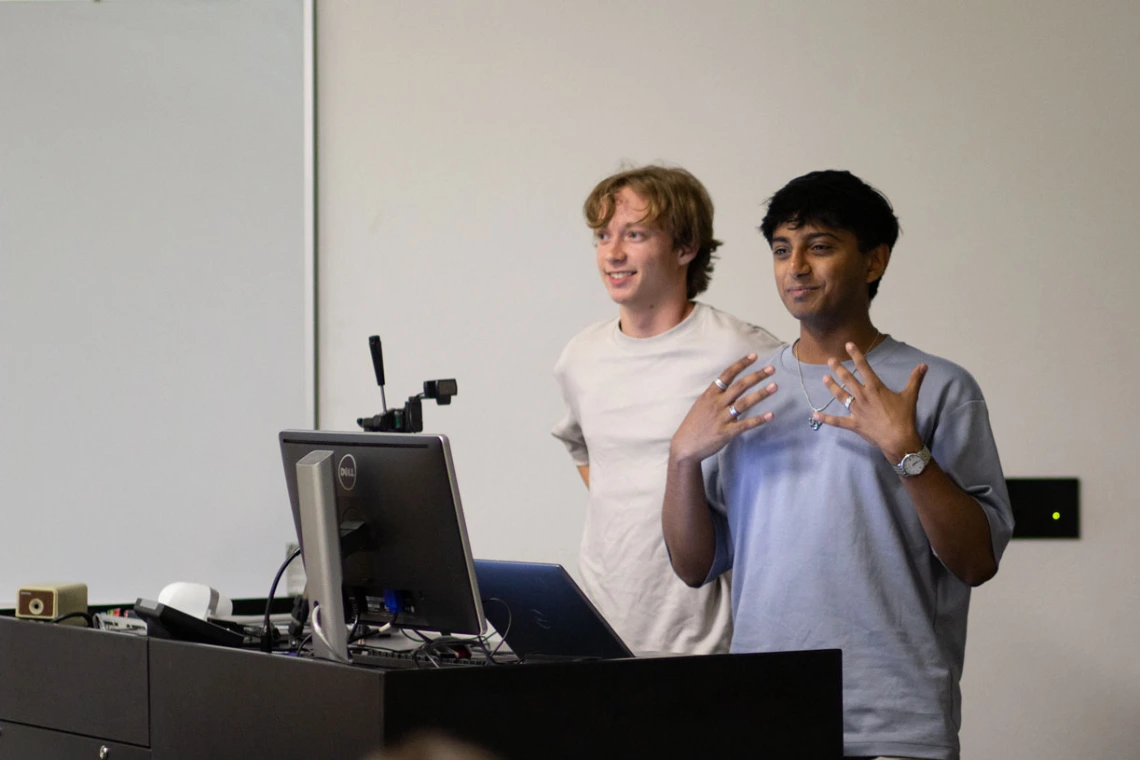 Photo of Owen Brosanders and Ojas Sanghi sharing their presentation.