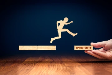 sihouette of person jumping from one step to another with the text "opportunity" 