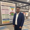 Imran Mithu standing in front of his research poster "Assessing Heat Action Planning in Arizona through Hierarchy of Controls and the Socio-ecological Model Lens" at the 2025 ISES/ISEE Conference.