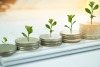 image of seedlings and coins